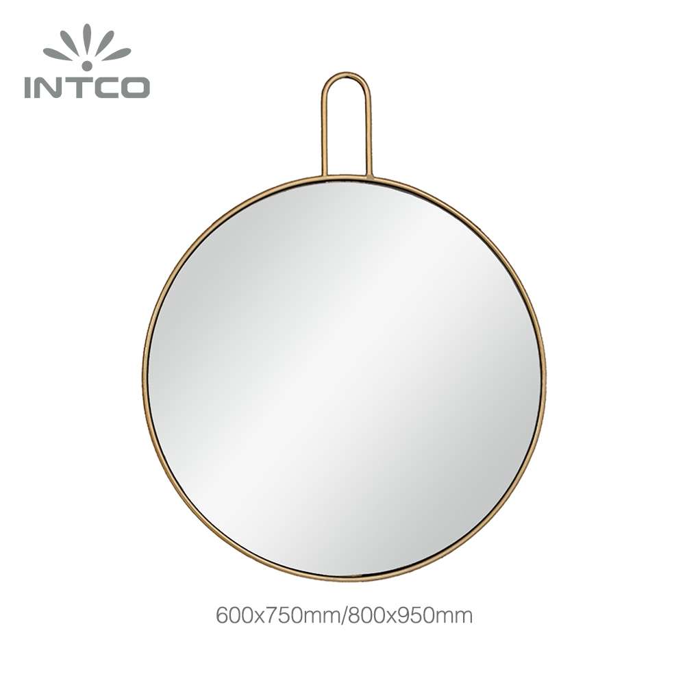 Gold wall mounted metal frame round mirror